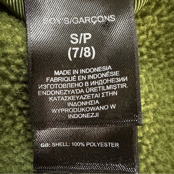 The North Face boys  full-zip fleece jacket in green with a neon yellow zipper. - Picture 6 of 6